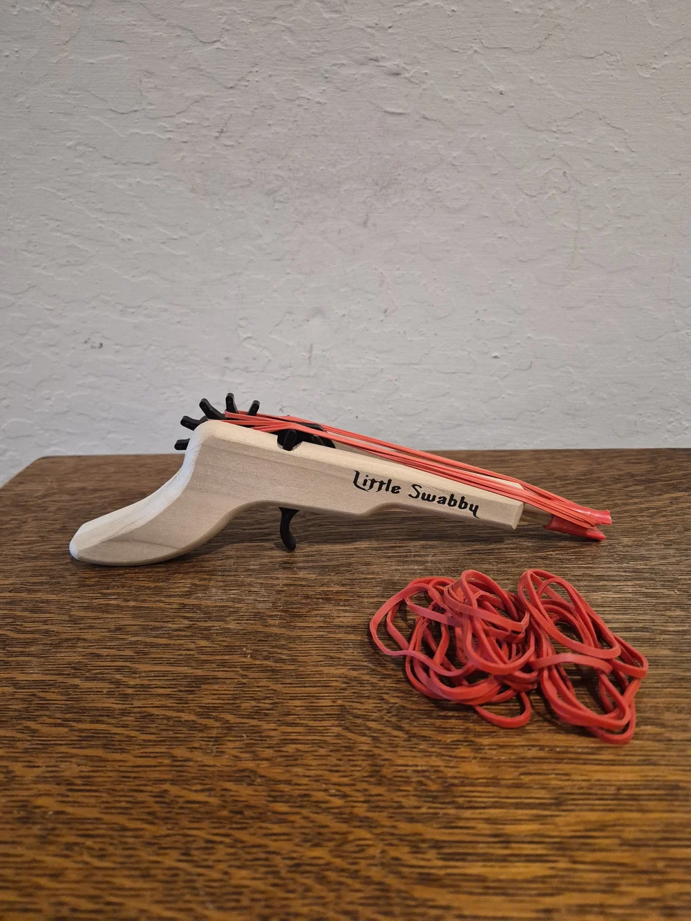 Magnum Enterprises Little Swabby Wooden Rubber Band Pistol Toy